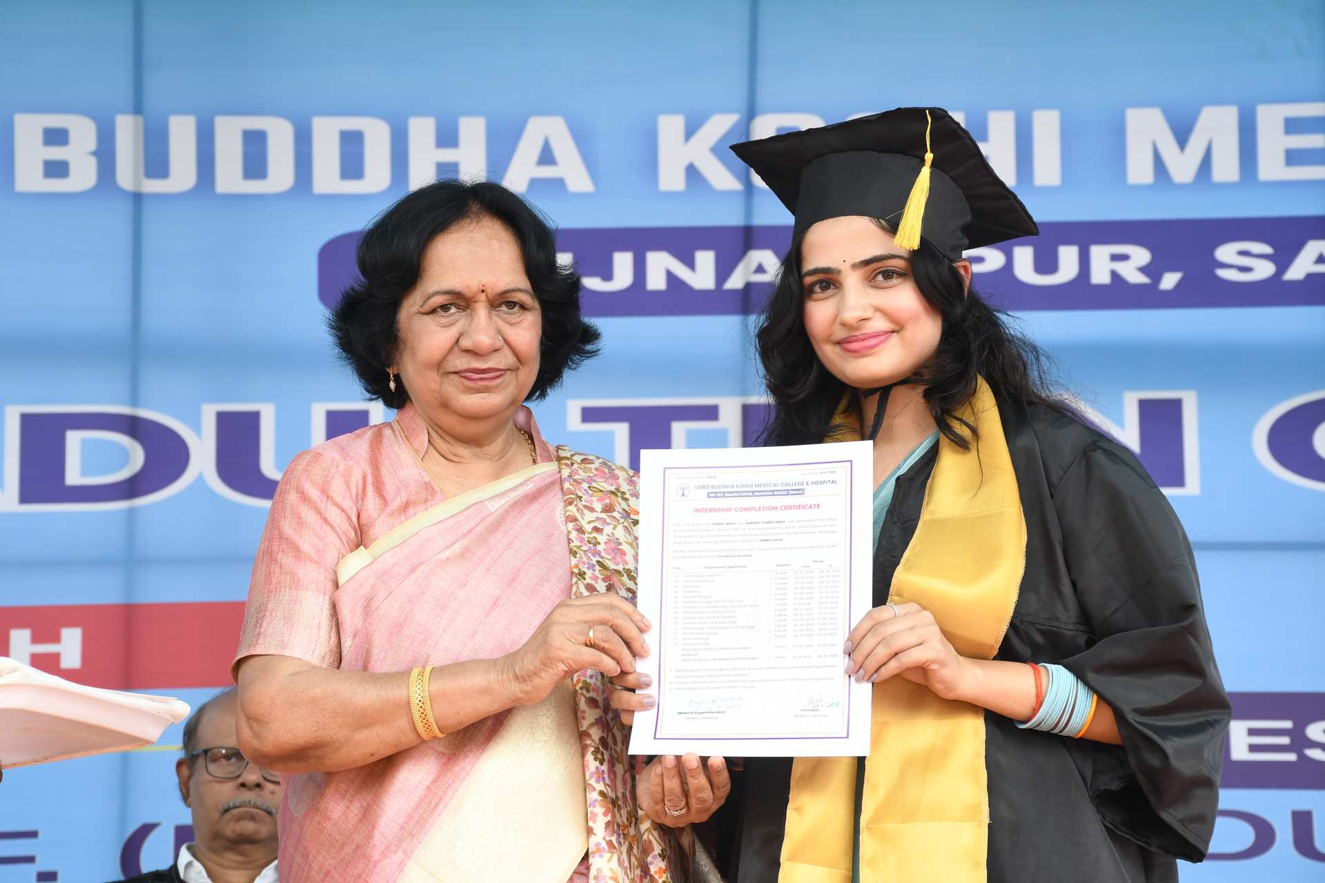 Student receiving award on stage