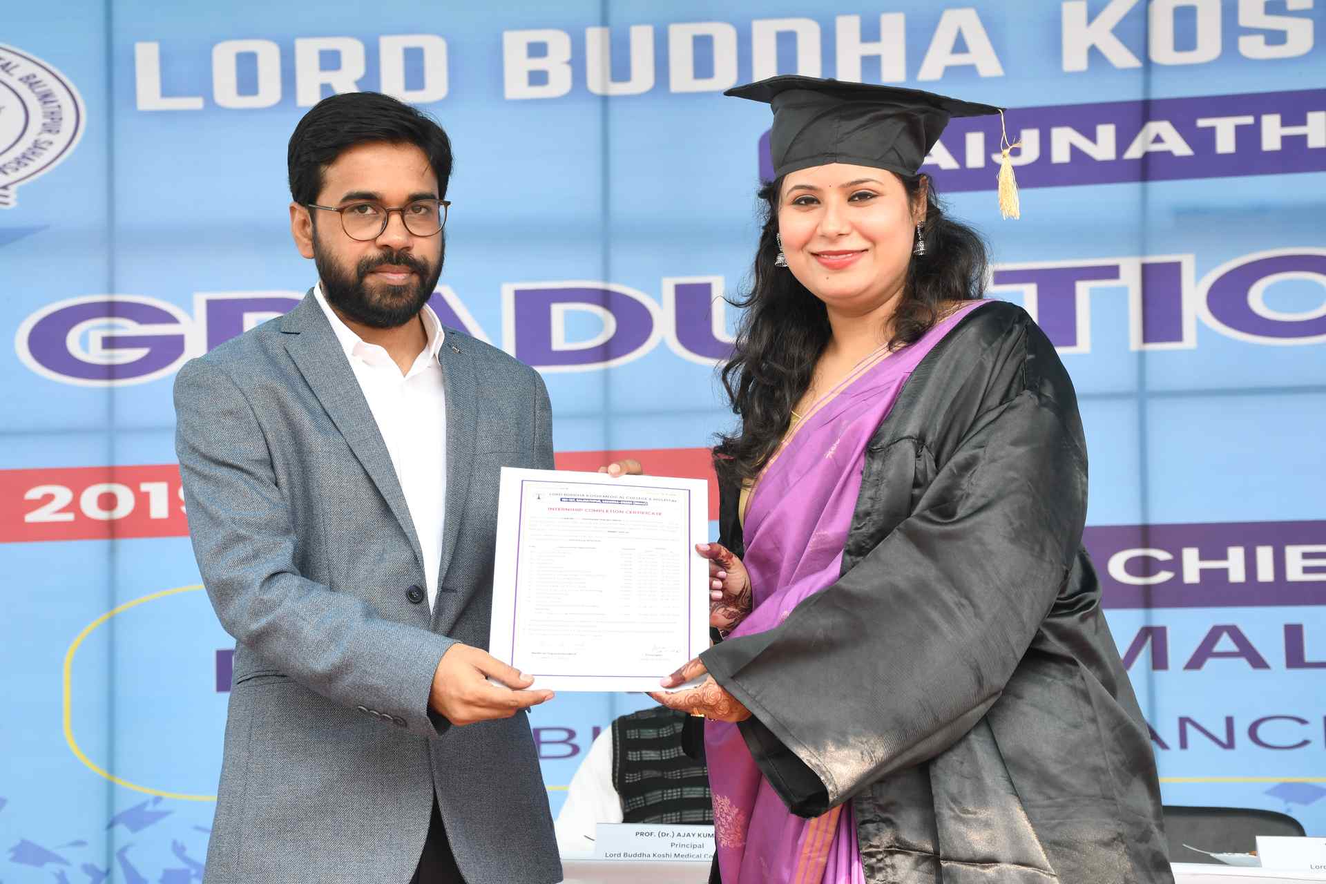Student receiving award